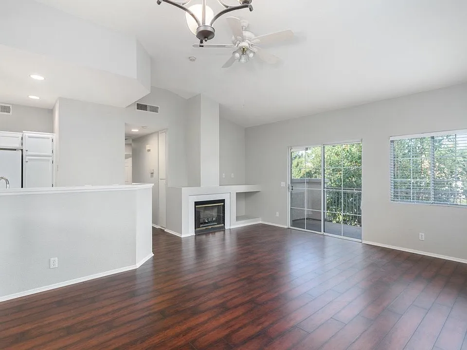 Hardwood like flooring and high vaulted ceilings