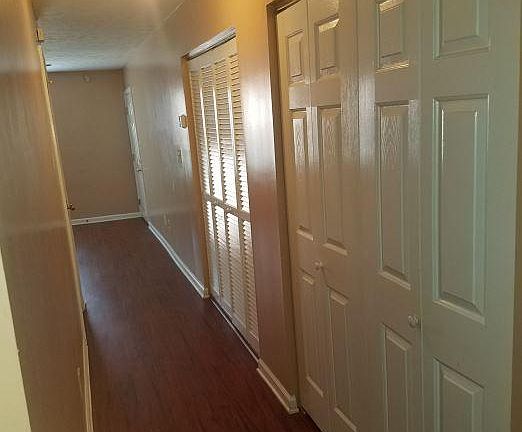 hallway ...washer and dryer and utility closets