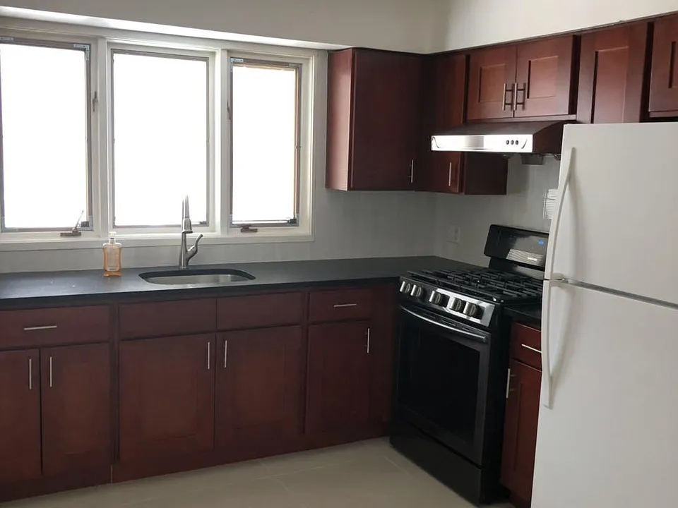 Kitchen with new counters, cupboards, and appliances