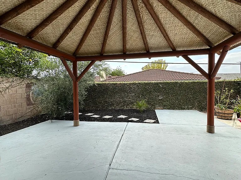 OUTDOOR SEATING AREA UNDER PALAPA