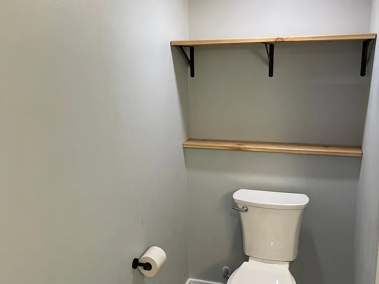 Custom wood accents and storage in every nook possible