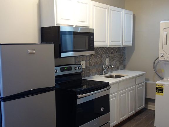 Brand new refrigerator/freezer and oven/stove