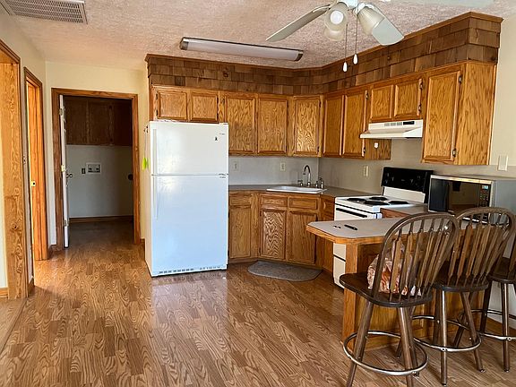 Kitchen and entrance to laundry and bathroom