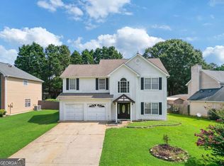 5465 Arrowind Rd NW, Lilburn, GA 30047