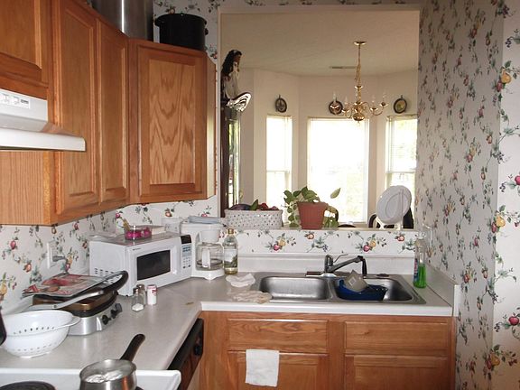 Kitchen opens to dining room