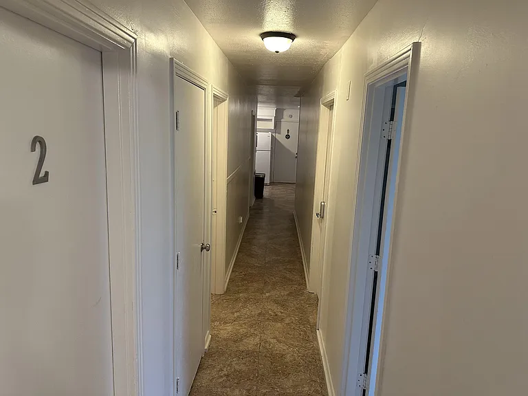 Main Hallway for Bedrooms 1-4 and Kitchen, Dinning, and Laundry Room (All Utilities Included)