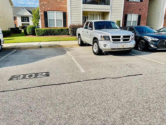 Designated Parking in 302 AND 303, and Visitor Parking