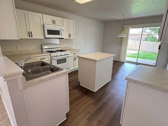 Modern kitchen with all new soft-close cabinets, appliances, sink and disposal.