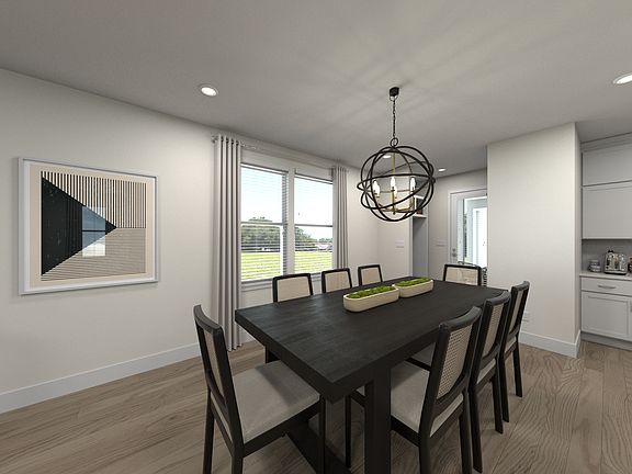 The open-concept floorplan allows for an easy flow between the kitchen and dining areas.
