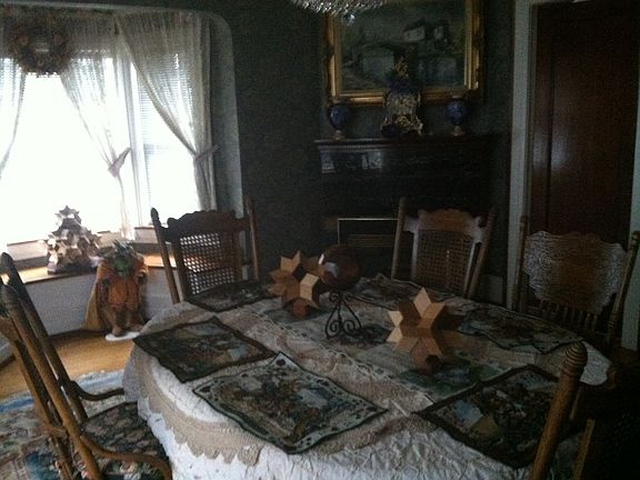 dining room with gas firepla