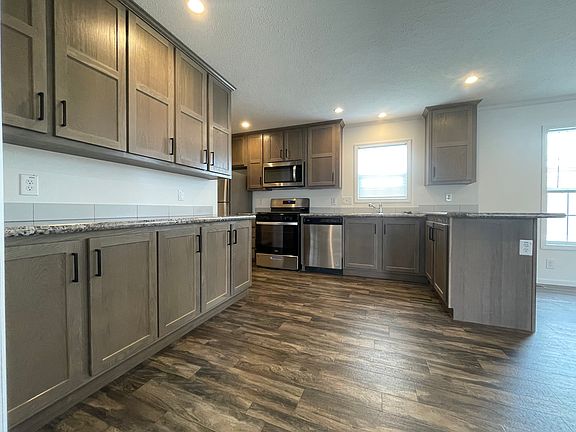 2nd image of 7204 E Grand River Ave Lot 498