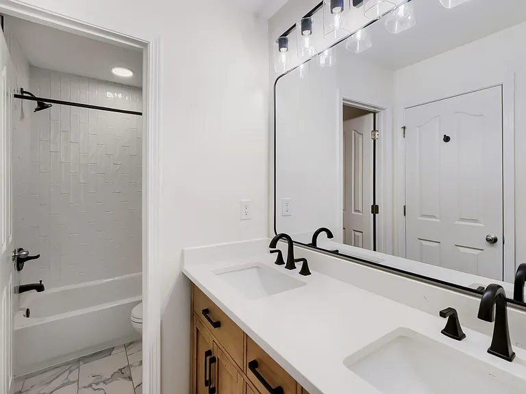 Second full bath with dual vanities