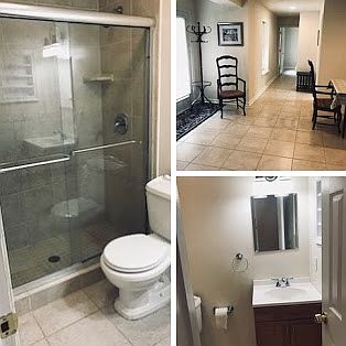 Front door on left, hallway, and bathroom on right.