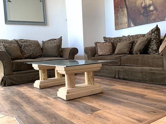 Living room, patio and closet on the 1st level. NEW hardwood floors!