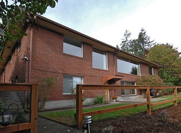 View of lower level and back side of upper level.  Fully finished M-I-L below.