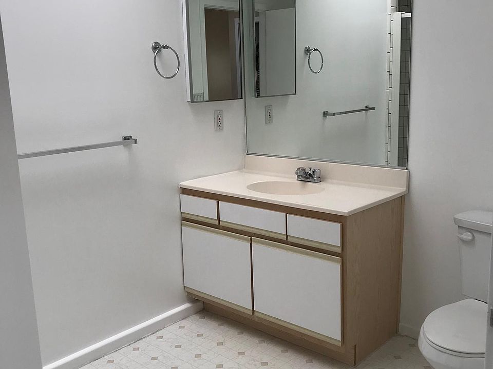 Spacious Guest Bathroom with standing shower and pantry stor