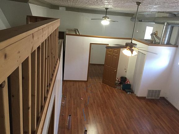 Looking from to of loft towards bedroom