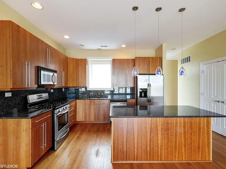 The living areas have been freshly painted in a lighter neutral tone