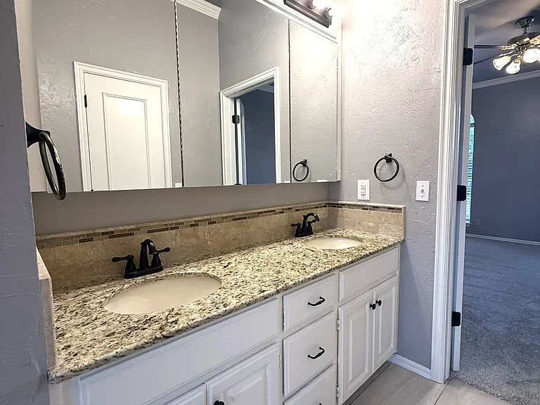 Double sinks for the master bathroom suite.