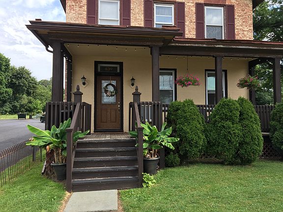 Front private entrance with covered porch