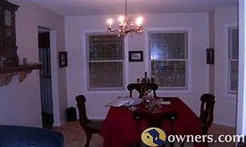 Formal dining room with bay windows