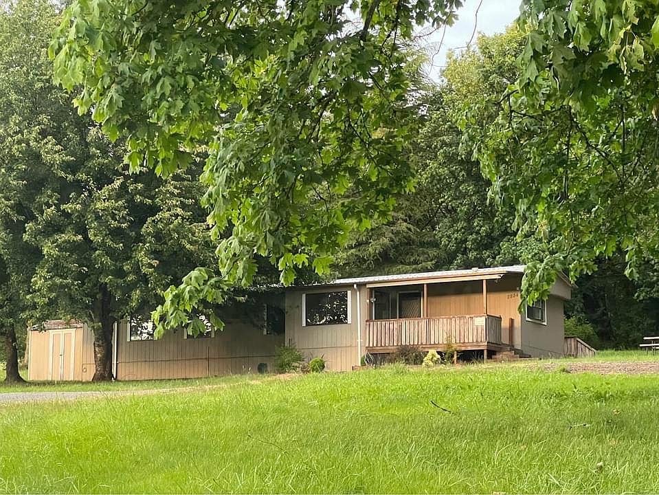 Nestled in the trees, your future home looks out on the complete privacy of 5 beautiful acres!