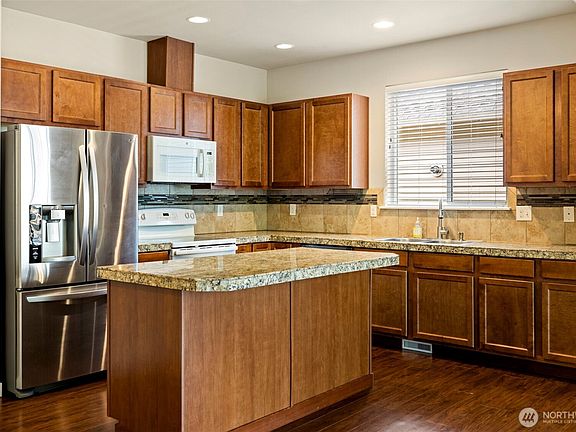 5th image of 518 Grass Lake Street Ct NW
