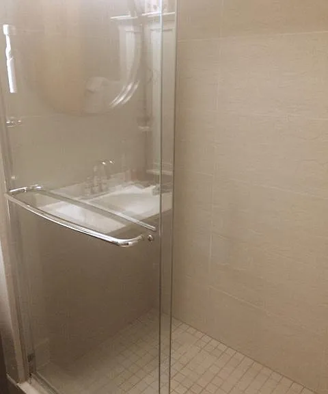 Glass sliding doors shower