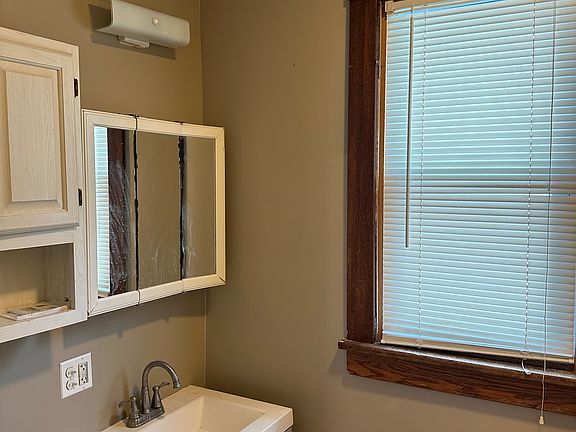 There are three bathrooms