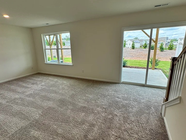 Guest bedroom downstairs with full bathroom
