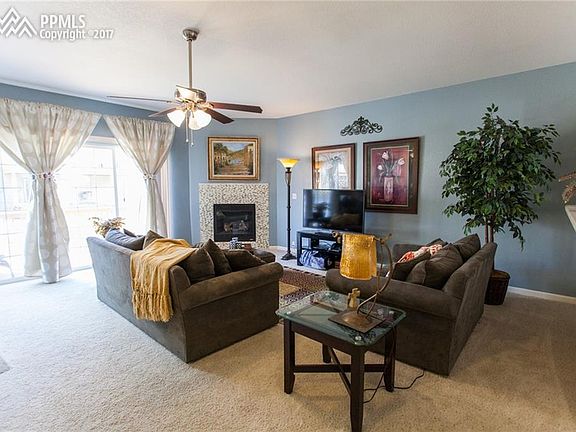Living room walks out to large wood deck.