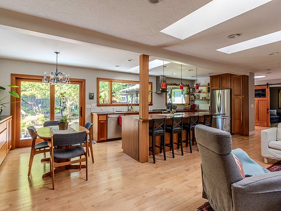 Bright and comfortable living space with plenty of seating for relaxing or entertaining.