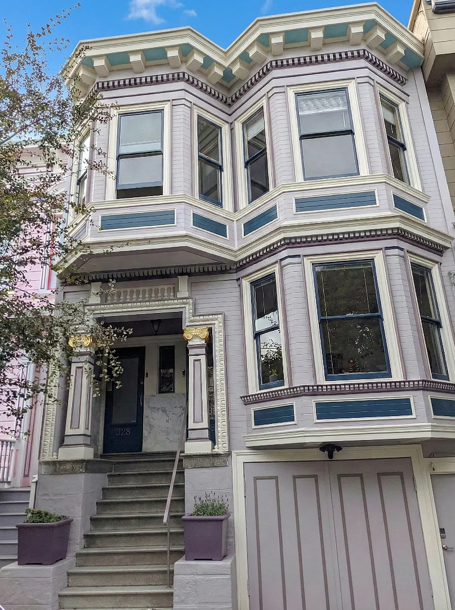 Building exterior. This residence is the top floor. - 328 Lexington St