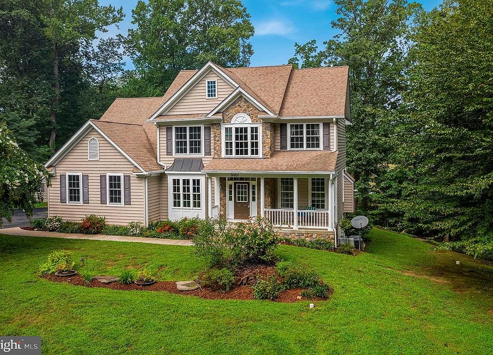 Lovely colonial on 14 acres tucked among trees gal