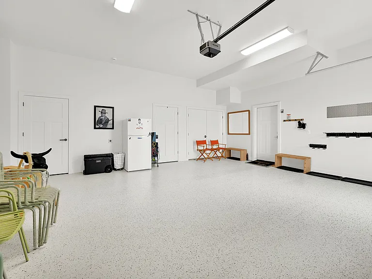 Two car garage with ski rack.