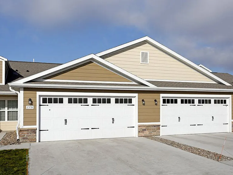 Charming Neighborhood Setting with Two-Car Garages