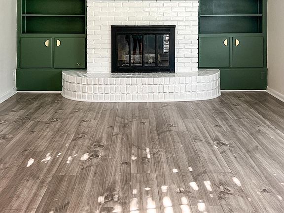 just updated the fireplace and built in cabinetry with a modern feel.