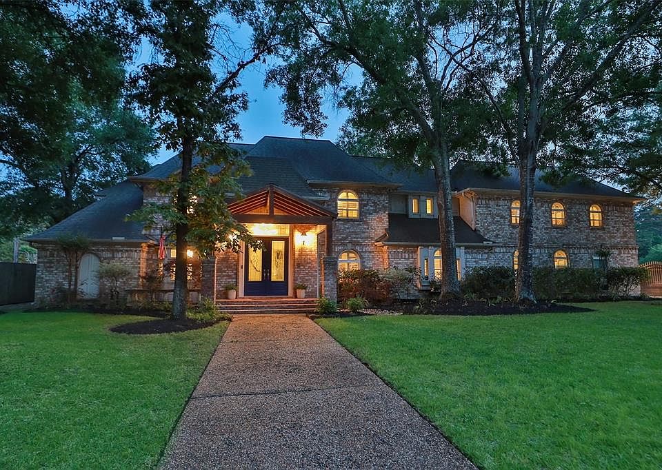 WELCOME HOME! ; This stunning Champion Forest estate home sits on an oversized 15,925 square foot lot in an established neighborhood, zoned to acclaimed Klein ISD schools.