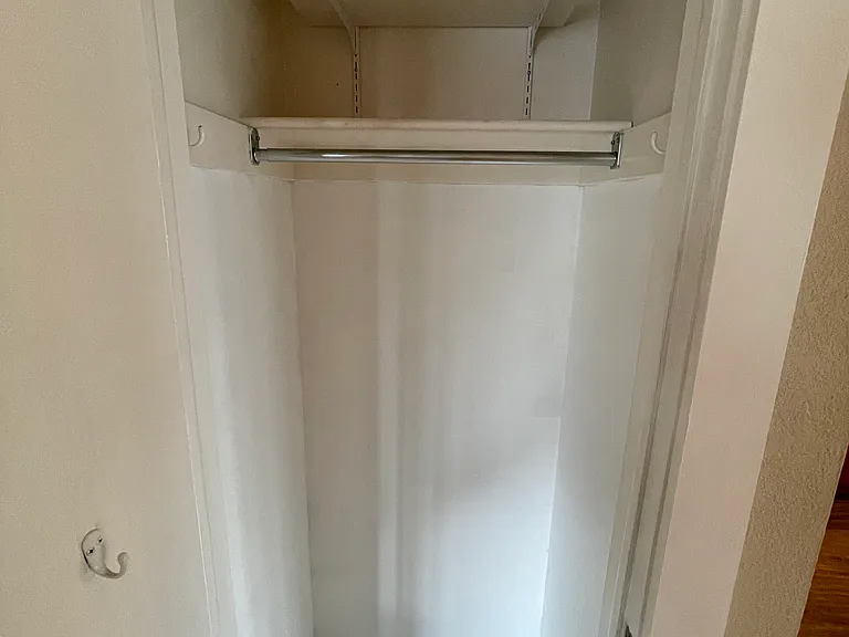 Hallway coat/storage closet #2
