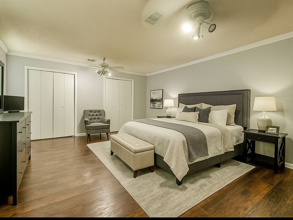 Oversize primary bedroom with dual closets
