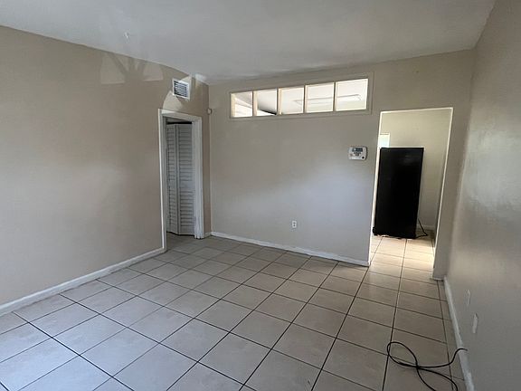 From entry looking into living room & kitchen