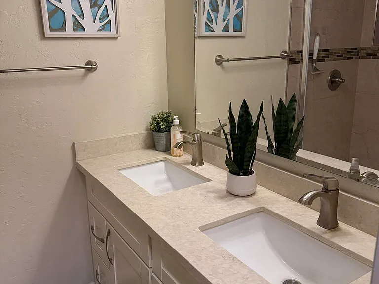 Spacious bathroom with two sinks.