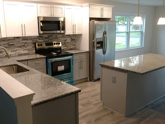 Marble mosaic backsplash.