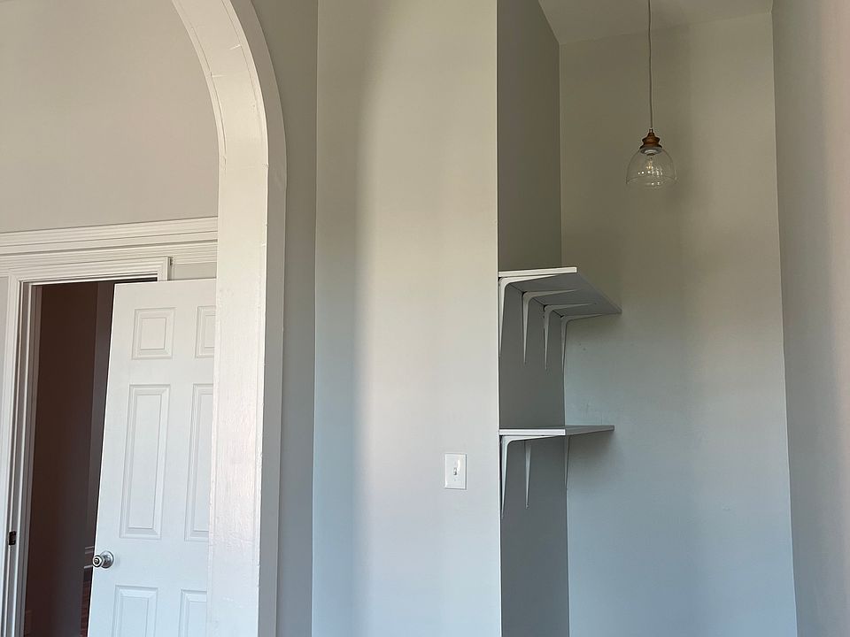 Built in shelving and modern lighting