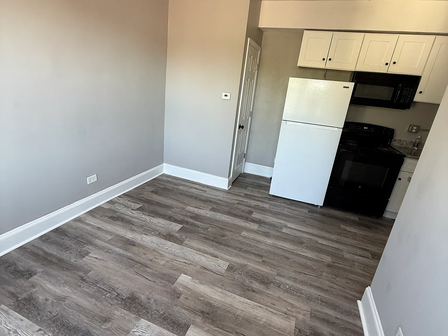 Living room looking into kitchen