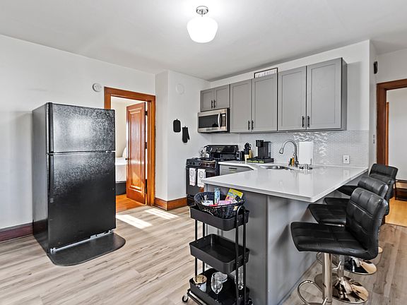 Kitchen showing refrigerator
