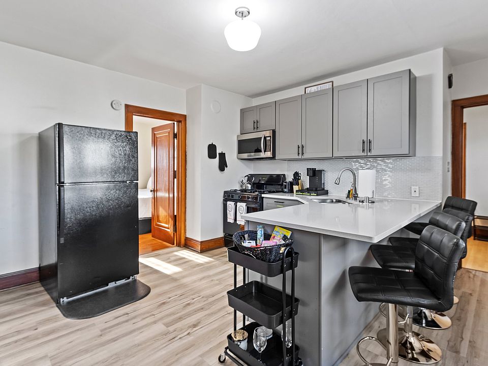 Kitchen showing refrigerator