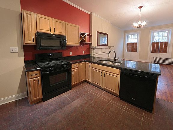Kitchen with tile floor and granite counter