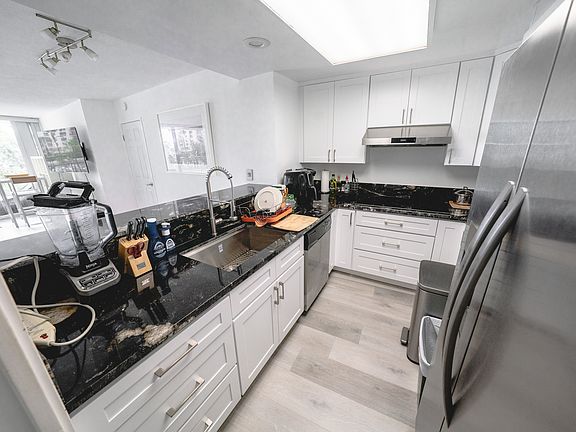 Brand NEW Kitchen! Flooring, counters, cabinets, and almost all the appliances are NEW!
