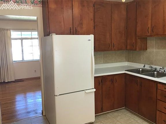 View from kitchen eating space toward the living room.